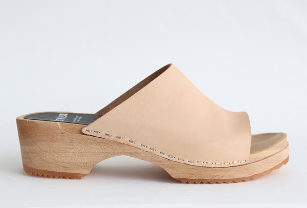 open toe slip on shoe with natural leather upper and wooden base