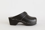 63 kids plain black clogs