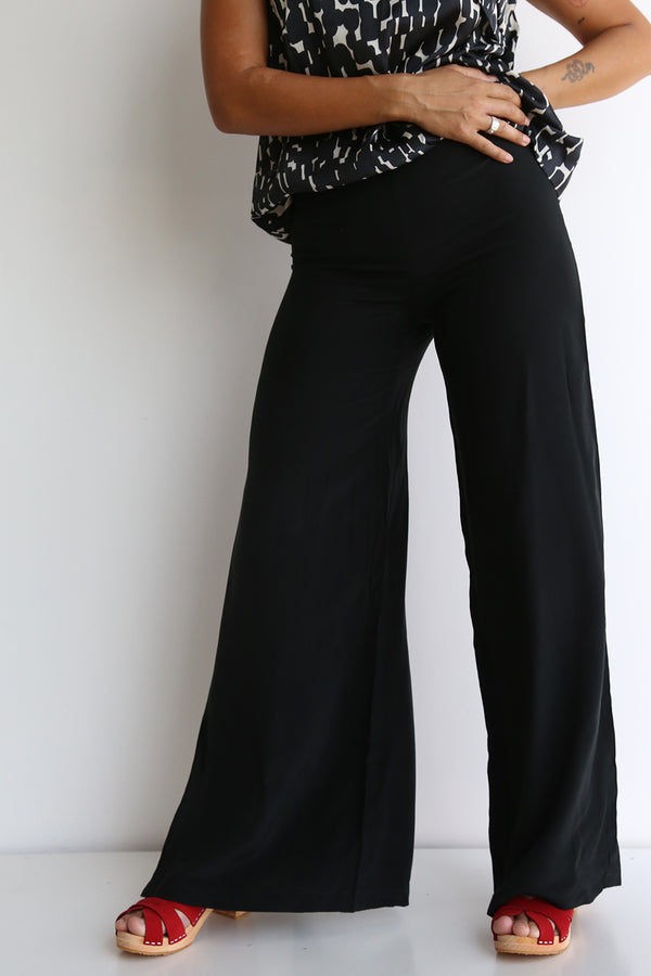 preloved silk pants black size XS