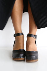 910 ester clog high black with brown base