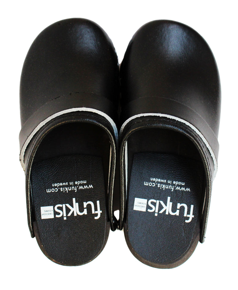 63 kids plain black clogs